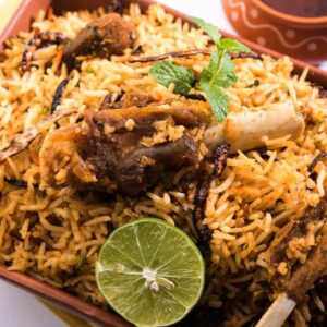 Goat (with bone) Biryani Served with Raita